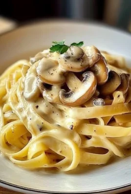 Tagliatelle con Crema di Parmigiano e Funghi Porcini
