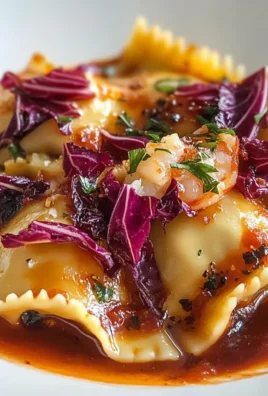 Ravioli di pesce al radicchio