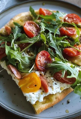 Focaccia senza glutine con rucola, stracciatella e pomodorini